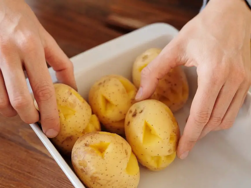 Cut the expense and the work by having a baked potato bar. 