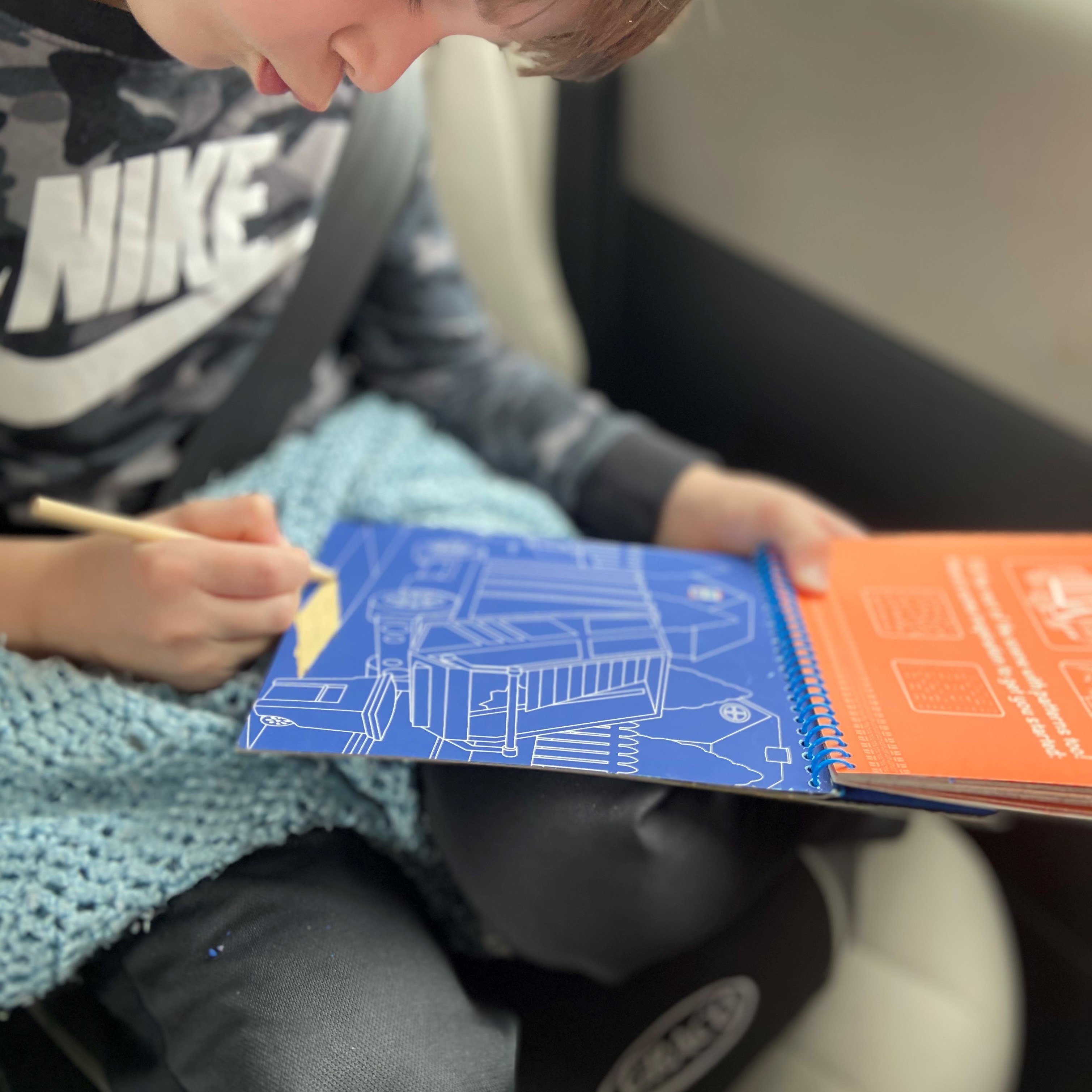 Scratch Art books keep my kids happy in the car on long road trips. 
