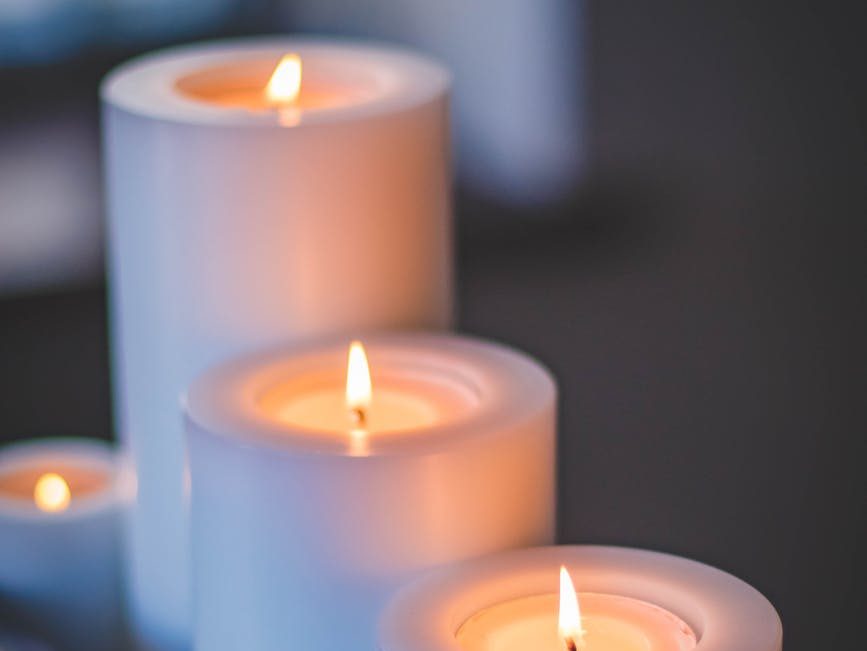 selective focus photography of candles