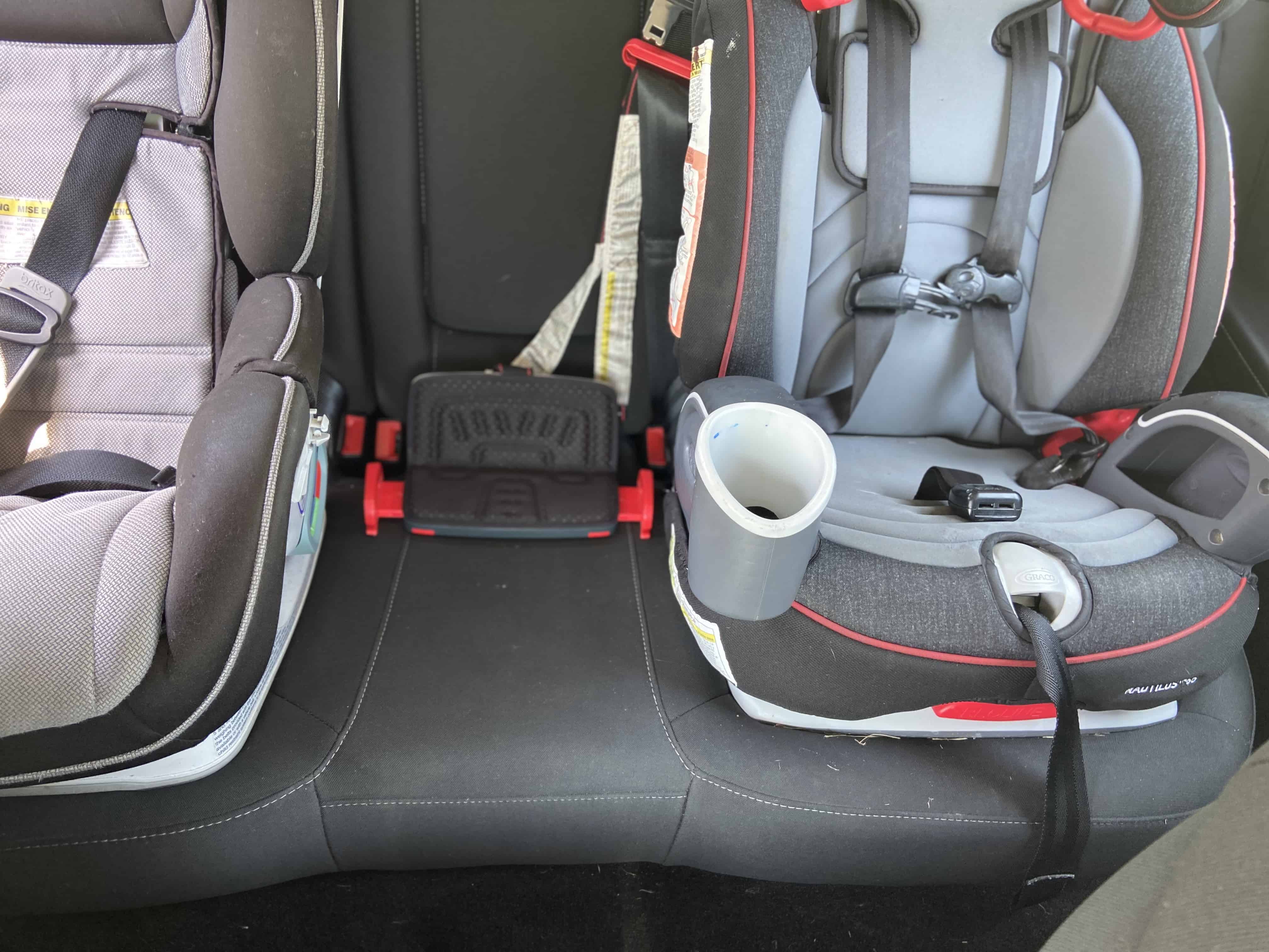The Mifold easily fits 3 car seats across. 