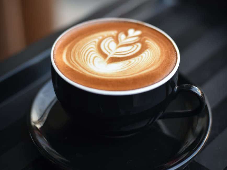 close up of coffee cup on table