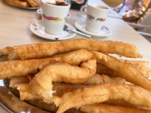 Chocolate and Churros at Cafe Futbol in Granada, Spain