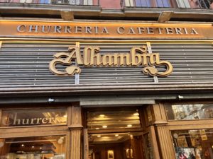 Cafeteria Alhambra is our favorite place for chocolate and churros in Granada Spain and a great place to take kids on a rainy day