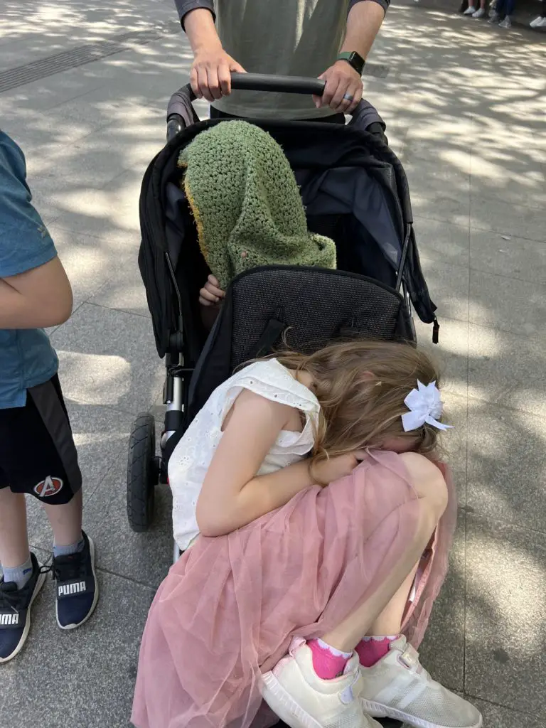 Children sleeping in double stroller