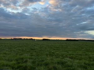 Sunrise over fields of Stonehenge
