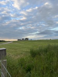 Sunrise with Stonehenge in the distance