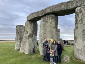 Family walking through Stonehenge