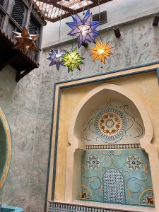Fountain mosaic and lanterns in Agrabah Cafe