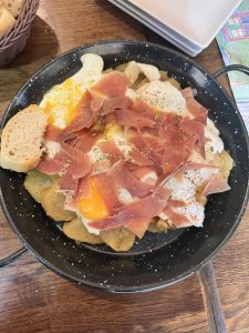 Fried potatoes with jamon, queso, and eggs