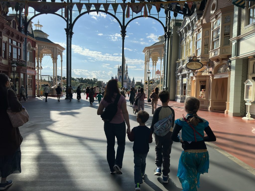 family walking into Disneyland Tokyo