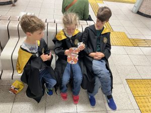 Children in Hogwarts robes