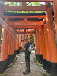 Man hiking Inari Shrine walk